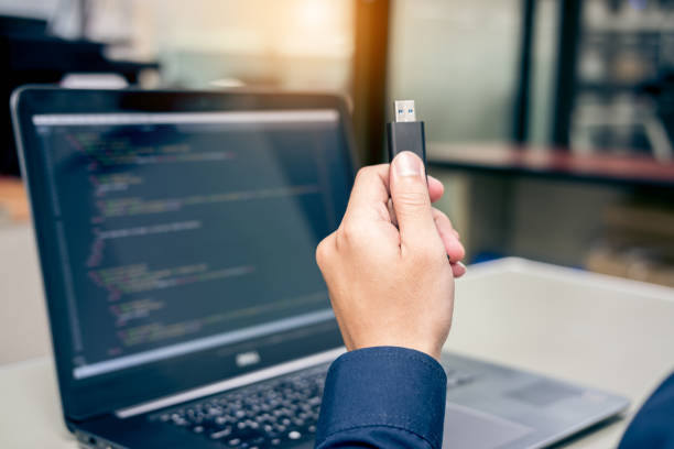 Image holding Jump Drive in hand
