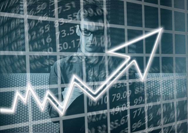 Graph going up with person in background